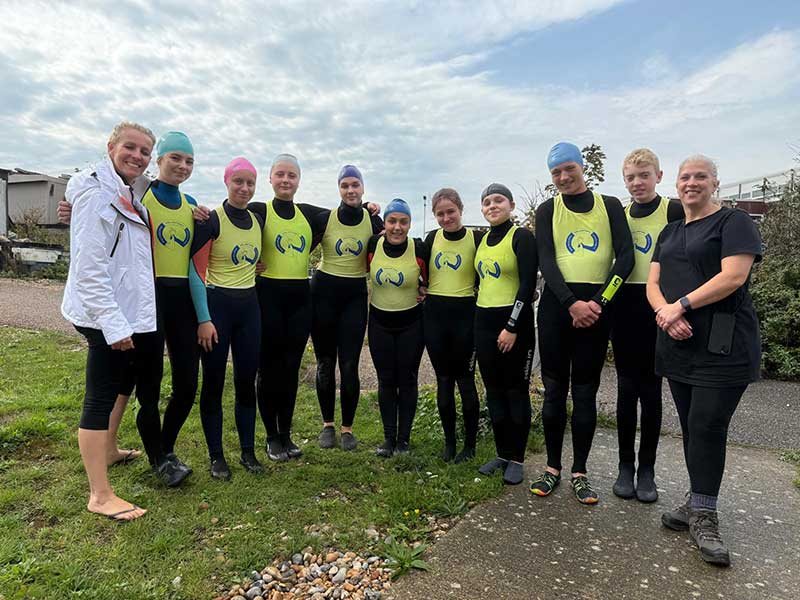 9 swimmers with Cathy left and Kate right.